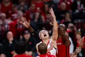 Nebraska Cornhusker guard C.J. Wilcher (0) tries for a lay up against Rutgers Scarlet Knight guard Jamichael Davis (1) in the first half during a college basketball game Sunday, March 3, 2024, in Lincoln, Neb. Photo by John S. Peterson.