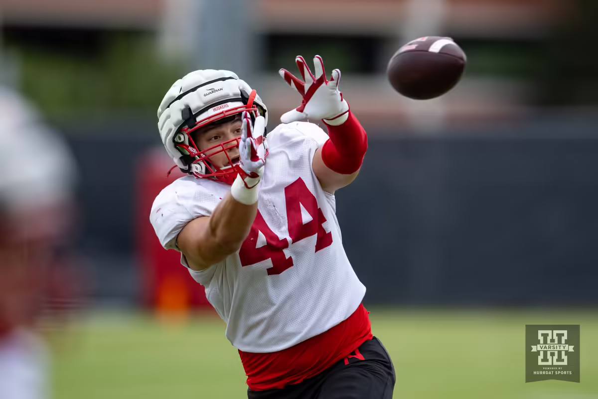 Nebraska Cornhusker Luke Lindenmeyer (44) reaches for the ball to make a catch during football practice Friday, August 9, 2024, in Lincoln, Nebraska. Photo John S. Peterson.