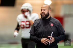 Nebraska coach Donovan Raiola giving instruction during football practice Friday, August 16, 2024, in Lincoln, Nebraska. Photo John S. Peterson.