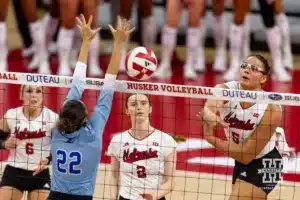 Nebraska Cornhusker Rebekah Allick (5) spikes the ball against Texas A&M CC Islander Katelyn Krienke (22) during the college volleyball game Friday, August 30, 2024, in Lincoln, Nebraska. Photo John S. Peterson.