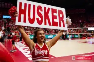 Nebraska Cornhusker cheer squad member holding a Husker sign for "Husker Power" against the Arizona State Sundevils during the college volleyball match Friday, September 13, 2024, in Lincoln, Nebraska. Photo John S. Peterson.