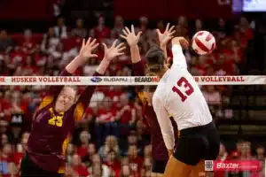 Nebraska Cornhusker Merritt Beason (13) spikes the ball down the line against the Arizona State Sundevils in the first set during the college volleyball match Friday, September 13, 2024, in Lincoln, Nebraska. Photo John S. Peterson.