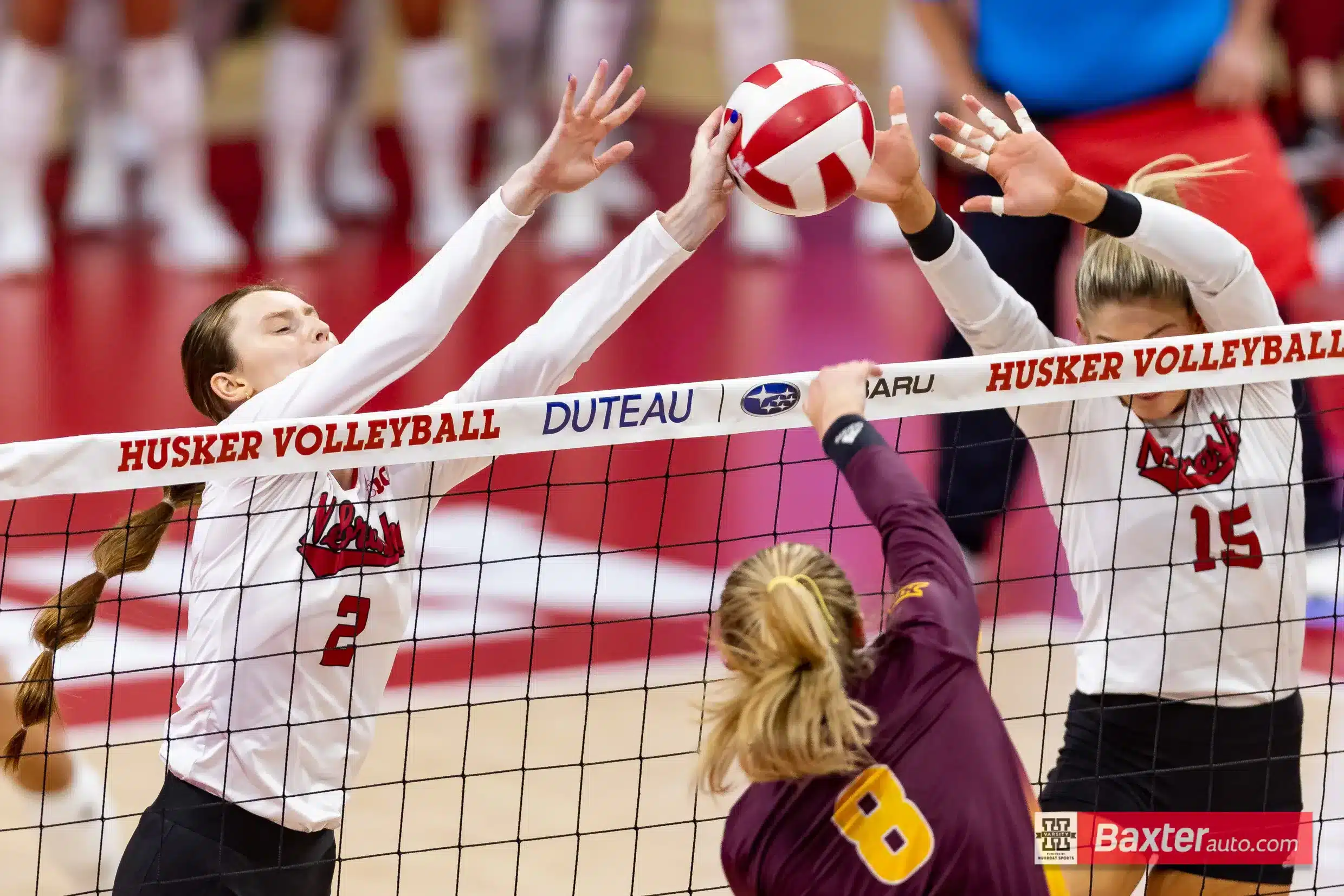 Nebraska Cornhusker Bergen Reilly (2) and Andi Jackson blocks the ball against Arizona State Sundevil outside hitter Geli Cyr (8) in the second set during the college volleyball match Friday, September 13, 2024, in Lincoln, Nebraska. Photo John S. Peterson.