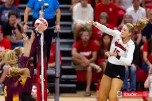 Nebraska Cornhusker Andi Jackson (15) spikes the ball against the Arizona State Sundevils in the third set during the college volleyball match Friday, September 13, 2024, in Lincoln, Nebraska. Photo John S. Peterson.