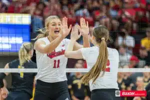 Nebraska Cornhusker Leyla Blackwell (11) and Bergen Reilly (2) celebrate against Witchita State during the college volleyball match Saturday, September 15, 2024, in Lincoln, Nebraska. Photo Jaelle Johnson.