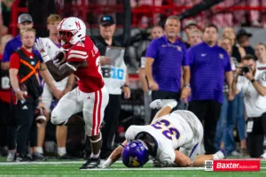 Nebraska Cornhusker running back Emmett Johnson (21) runs with the ball against during the college football game Saturday, September 14, 2024, in Lincoln, Nebraska. Photo John S. Peterson.