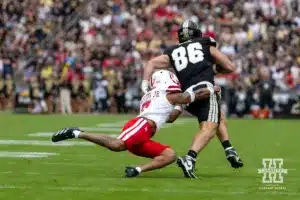 Nebraska Cornhusker defensive back Malcolm Hartzog Jr. (7) reaches for a tackel against Purdue Boilermaker tight end Max Klare (86) during a college football game Saturday, September 28, 2024, in West Lafayette, Indiana. Photo by John S. Peterson.