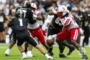 Nebraska Cornhusker linebacker Princewill Umanmielen (18) putting pressure against Purdue Boilermaker quarterback Hudson Card (1) during a college football game Saturday, September 28, 2024, in West Lafayette, Indiana. Photo by John S. Peterson.