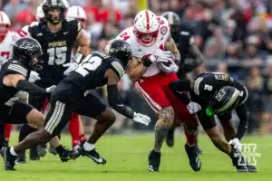 Nebraska Cornhusker tight end Thomas Fidone II (24) takes on Purdue Boilermaker linebacker Cooper Kitchel (42) and Nyland Green running with the ball during a college football game Saturday, September 28, 2024, in West Lafayette, Indiana. Photo by John S. Peterson.