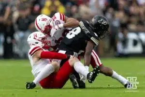 Nebraska Cornhusker linebacker John Bullock (5) and Javin Wright tackle Purdue Boilermaker wide receiver De'Nylon Morrissette (8) during a college football game Saturday, September 28, 2024, in West Lafayette, Indiana. Photo by John S. Peterson.