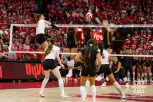 Nebraska Cornhusker Merritt Beason (13) tries for match point against the USC Trojans in the third set during a college volleyball match Sunday, September 29, 2024, in Lincoln, Nebraska. Photo by John S. Peterson.