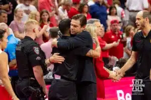 USC Trojans assistant and former Nebraska assistant Tyler Hildebrand gives Nebraska Cornhusker assistant a hug after the college volleyball match Sunday, September 29, 2024, in Lincoln, Nebraska. Photo by John S. Peterson.