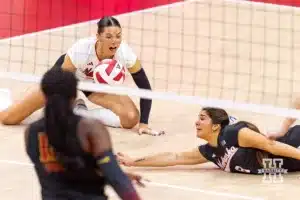 Nebraska Cornhusker Lexi Rodriguez (8) does a diving dig against the USC Trojans during a college volleyball match Sunday, September 29, 2024, in Lincoln, Nebraska. Photo by John S. Peterson.