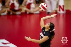 Nebraska Cornhusker Lexi Rodriguez (8) serves the ball against the USC Trojans during a college volleyball match Sunday, September 29, 2024, in Lincoln, Nebraska. Photo by John S. Peterson.