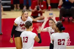 Nebraska Cornhusker Bergen Reilly (2) gives Merritt Beason high fives to celebrate a score against the USC Trojans during a college volleyball match Sunday, September 29, 2024, in Lincoln, Nebraska. Photo by John S. Peterson.