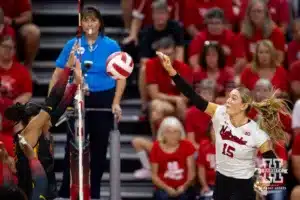 Nebraska Cornhusker Andi Jackson (15) spikes the ball against USC Trojan outside hitter Jadyn Livings (42) during a college volleyball match Sunday, September 29, 2024, in Lincoln, Nebraska. Photo by John S. Peterson.