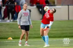 Nebraska Cornhusker goalkeeper Cece Villa (00) warms up with assistant coach Marty Everdingto take on the Oregon Ducks during a soccer match Thursday, October 17, 2024, in Lincoln, Nebraska. Photo by John S. Peterson.