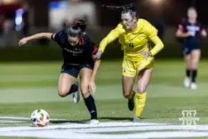 Nebraska Cornhusker midfielder Haley Peterson (2) dribbles the ball against Oregon Duck midfielder Livvy Moore (4) during a soccer match Thursday, October 17, 2024, in Lincoln, Nebraska. Photo by John S. Peterson.