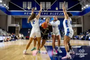 Creighton Bluejay guard Kennedy Townsend (2), guard Molly Mogensen (21), and guard Jayme Horan (12) defend against Southwest Minnesota State Mustang guard Bri Stoltzman (2) in the first half during a college women’s basketball game Thursday, October 30, 2024, in Lincoln, Nebraska. Photo by John S. Peterson.