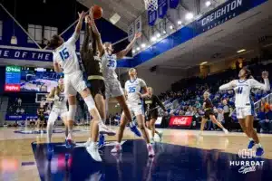 Creighton Bluejay guard/forward Morgan Maly (30) grabs the rebound against Southwest Minnesota State Mustang center Kennadi Buchholz (35) in the first halg during a college women’s basketball game Thursday, October 30, 2024, in Lincoln, Nebraska. Photo by John S. Peterson.