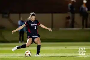 Nebraska Cornhusker midfielder Ella Guyott (5) kicks the ball against the Oregon Ducks during a soccer match Thursday, October 17, 2024, in Lincoln, Nebraska. Photo by John S. Peterson.