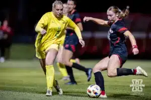 Nebraska Cornhusker forward Sarah Weber (42) takes a shot against Oregon Duck Lexi Lerwick during a soccer match Thursday, October 17, 2024, in Lincoln, Nebraska. Photo by John S. Peterson.