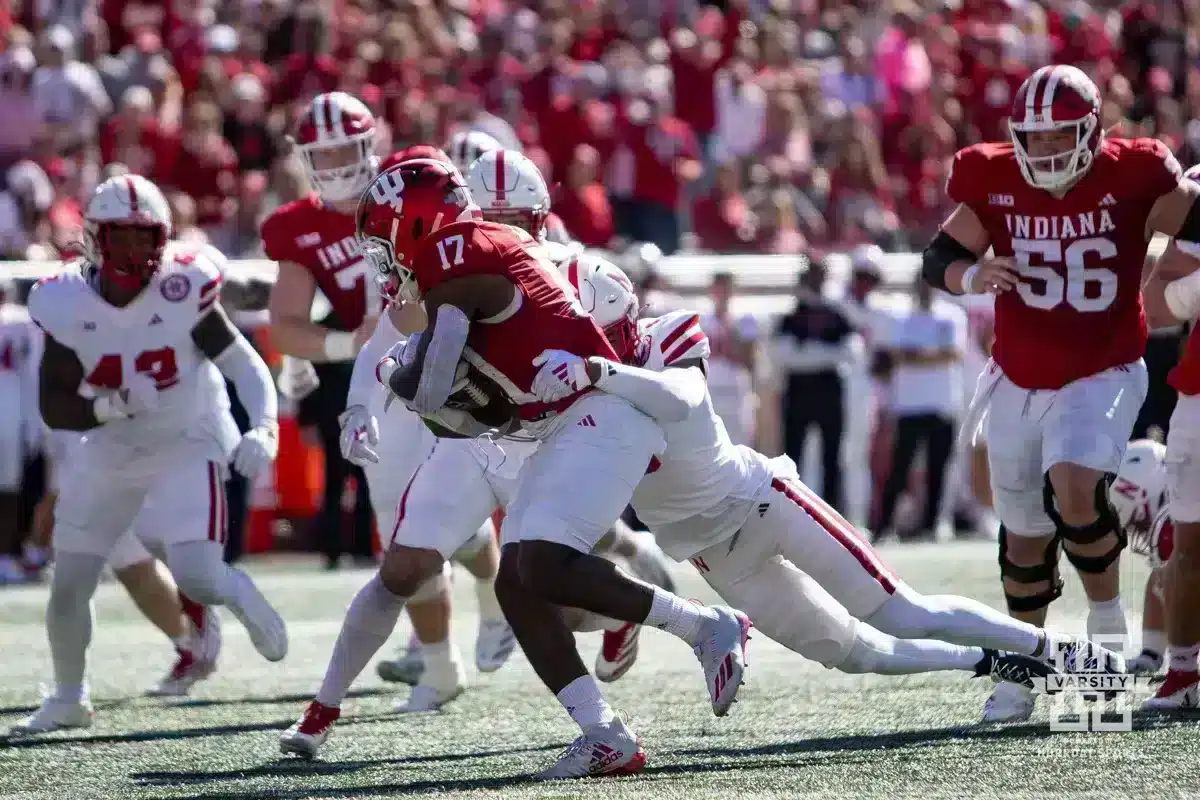 Nebraska Cornhusker defensive back DeShon Singleton (8) tackles Indiana Hoosier running back Ty Son Lawton (17) during a football game Saturday, October 19, 2024, in Bloomington, Indiana. Photo by John S. Peterson.
