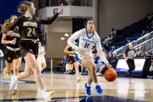 Creighton Bluejay guard Kiani Lockett (11) drives to the basket for a lay up against Southwest Minnesota State Mustang guard Kadence Hesse (24) in the second half during a college women’s basketball game Thursday, October 30, 2024, in Lincoln, Nebraska. Photo by John S. Peterson.