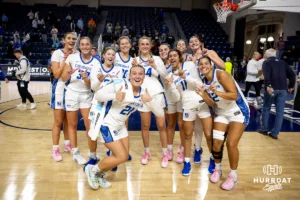 Creighton Bluejays pose for a photo as they head to the locker room after the win over Southwest Minnesota State Mustangs during a college women’s basketball game Thursday, October 30, 2024, in Lincoln, Nebraska. Photo by John S. Peterson.