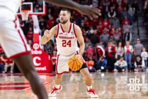 Nebraska Cornhusker guard Rollie Worster (24) dribbles the ball against the Fairleigh Dickinson Knights in the first half during a college basketball game Wedday, November 13, 2024, in Lincoln, Nebraska. Photo by John S. Peterson.