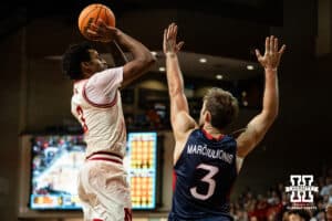 Nebraska Cornhusker guard Brice Williams (3) takes a jump shot against St. Mary's Gaels guard Augustas Marciulionis (3) during a college basketball game Sunday, November 17, 2024 in Sioux Falls, South Dakota.