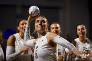 Creighton Bluejay middle blocker Kiara Reinhardt (5) throws a mini volleyball to a fan during a college volleyball match against the St. John's Red Storm Friday, November 1, 2024, in Omaha, Nebraska. Photo by John S. Peterson.