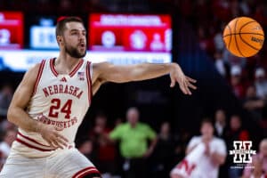 Nebraska Cornhuskers guard Rollie Worster (24) makes a pass against the South Dakota Coyotes in the first half during a college basketball game Wednesday, November 27, 2024, in Lincoln, Nebraska. Photo by John S. Peterson.