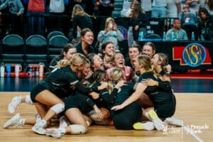 EMf celebrates their win over Central Valley during the semi-finals of the 2024 NSAA Volleyball Championships Friday, November 8, 2024, in Lincoln, Nebraska. Photo by Mike Sautter.