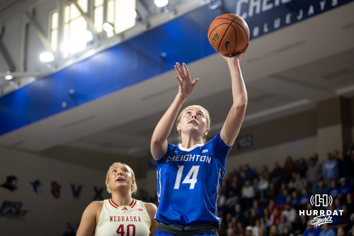 Nebraska Cornhusker guard Callin Hake (14) makes a layup against Nebraska Cornhusker center Alexis Markowski (40) in the first half during a women’s college basketball game Friday, November 22, 2024 in Omaha, Nebraska. Photo by John S. Peterson.