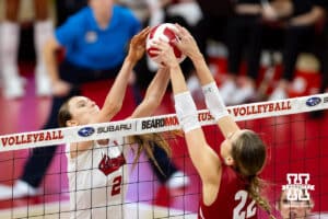 Nebraska Cornhusker setter Bergen Reilly (2) battles Wisconsin Badger libero Julia Orzol (22) at the net in the first set during a college volleyball match Saturday, November 23, 2024 in Lincoln, Nebraska. Photo by John S. Peterson.