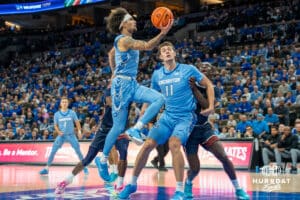 Pop Isaacs drives to the hoop during a college basketball game November 10th, 2024 in Omaha Nebraska. Photo by Brandon Tiedemann.