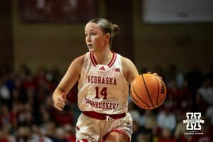 Nebraska Cornhusker guard Callin Hake (14) dribbles the ball down the court against the South Dakota Coyotes during a college women's basketball game Saturday, November 16, 2024 in Sioux Falls, South Dakota. Photo by Collin Stilen.