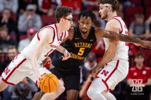 Nebraska Cornhusker guard Gavin Griffiths (12) dribbles the ball against Bethune-Cookman Wildcat guard Gianni Hunt (5) in the first half during a college baskteball game Saturday, November 9, 2024, in Lincoln, Nebraska. Photo by John S. Peterson.