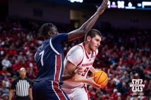 Nebraska Cornhusker forward Berke Buyuktuncel (9) drives to the basket against Fairleigh Dickinson Knight forward Bismark Nsiah (7) in the first half during a college basketball game Wednesday, November 13, 2024, in Lincoln, Nebraska. Photo by John S. Peterson.