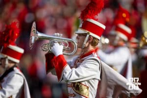 Nebraska Cornhusker matching band member Parker Peterson plays the mellophone during the pre-game performance before the college football game between the Nebraska Cornhuskers and the Wisconsin Badgers Saturday, November 23, 2024 in Lincoln, Nebraska. Photo by John S. Peterson.