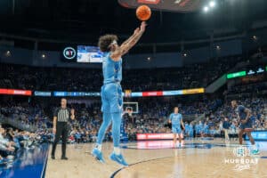 Pop Isaacs shoots a 3 pointer during a college basketball game November 10th, 2024 in Omaha Nebraska. Photo by Brandon Tiedemann.