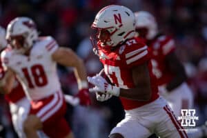 Nebraska Cornhusker wide receiver Jacory Barney Jr. (17) returns the ball on the opening kickoff against the Wisconsin Badgers during a college football game Saturday, November 23, 2024 in Lincoln, Nebraska. Photo by John S. Peterson.