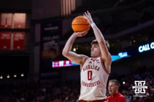 Nebraska Cornhuskers guard Connor Essegian (0) makes a three-point shot against the South Dakota Coyotes in the first half during a college basketball game Wednesday, November 27, 2024, in Lincoln, Nebraska. Photo by John S. Peterson.