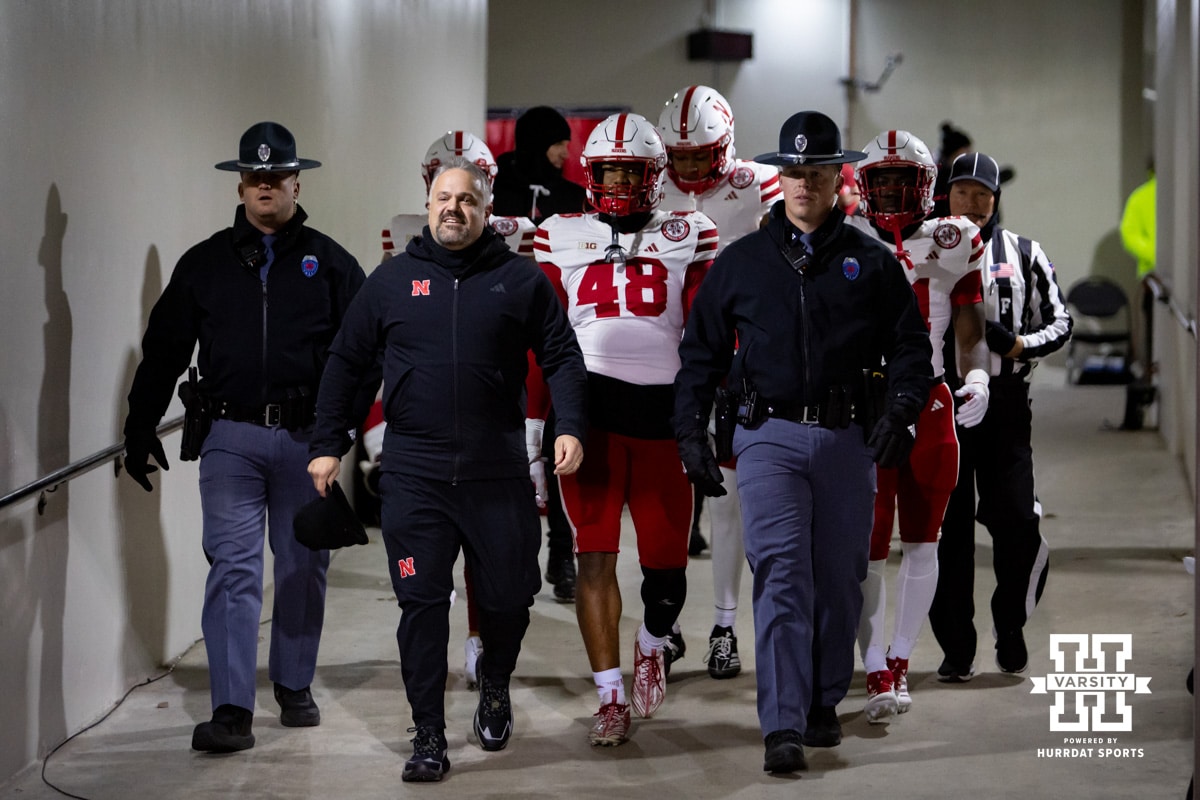 Nebraska Cornhuskers head coach Matt Rhule leads the captains out for the coin toss against the Iowa Hawkeyes during a college football game Friday, November 29, 2024, in Iowa City, Iowa. Photo by John S. Peterson.