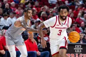 UT Rio Grande Valley Vaqueros guard Howie Fleming Jr. (5) tries to take a shot against Nebraska Cornhusker center Braxton Meah (34) and forward Berke Buyuktuncel (9) in the first half during a college baskteball game Monday, November 4, 2024, in Lincoln, Nebraska. Photo by John S. Peterson.