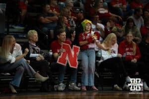 Nebraska Cornhusker fans watching the acton on the court against the South Dakota Coyotes during a college women's basketball game Saturday, November 16, 2024 in Sioux Falls, South Dakota. Photo by Collin Stilen.