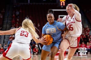 Nebraska Cornhusker guard Britt Prince (23) reaches for the ball as guard Kendall Moriarty (15) guards Southern Lady Jaguar guard Aleighyah Fontenot (2) in the first half during a college basketball game Tuesday, November 12, 2024, in Lincoln, Nebraska. Photo by John S. Peterson.