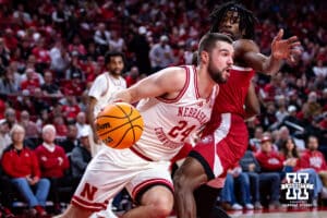 Nebraska Cornhuskers guard Rollie Worster (24) dribbles the ball along the baseline against the South Dakota Coyotes in the first half during a college basketball game Wednesday, November 27, 2024, in Lincoln, Nebraska. Photo by John S. Peterson.