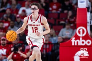 Nebraska Cornhusker guard Gavin Griffiths (12) dribbles the ball against the Fairleigh Dickinson Knights in the first half during a college basketball game Wednesday, November 13, 2024, in Lincoln, Nebraska. Photo by John S. Peterson.